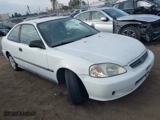 1999 Honda Civic DX with VIN 1HGEJ6220XL050962, listed as a IAAI auction lot 41188298 with 181,595 mi miles. Bid and sale history available at carsss.com. Image 1.