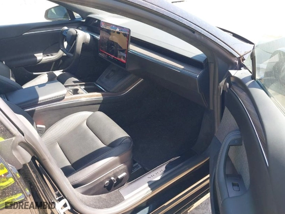 2021 Tesla Model S Plaid with VIN 5YJSA1E66MF452258, listed as a IAAI auction lot 41832000 with 42,845 mi miles. Bid and sale history available at carsss.com. Image 5.