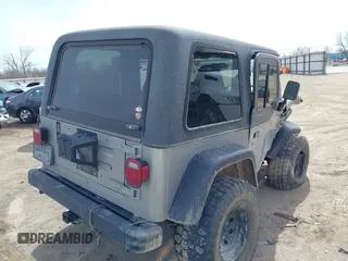 2002 Jeep Wrangler X with VIN 1J4FA39S82P707610, listed as a IAAI auction lot 41709953 with 1 mi miles. Bid and sale history available at carsss.com. Image 4.