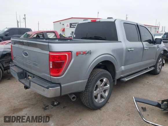 2023 Ford F-150 XL with VIN 1FTFW1E51PKF98102, listed as a IAAI auction lot 41594097 with 33,300 mi miles. Bid and sale history available at carsss.com. Image 4.