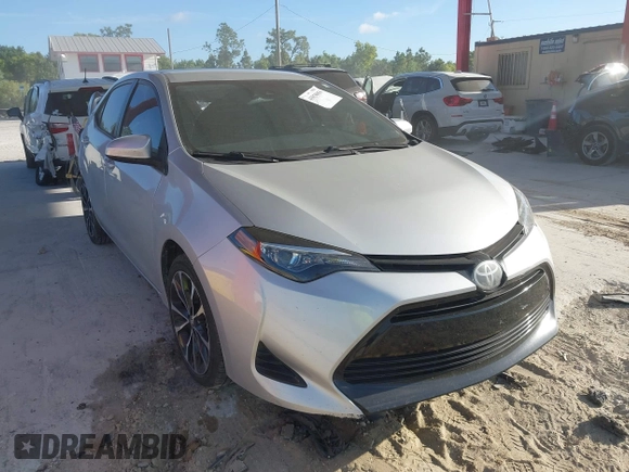 2019 Toyota Corolla L with VIN 5YFBURHE2KP902370, listed as a IAAI auction lot 41858056 with 92,092 mi miles. Bid and sale history available at carsss.com. Image 1.