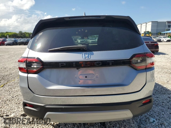 2024 Honda Pilot EX-L 7 Passenger with VIN 5FNYG2H50RB007894, listed as a Copart auction lot 59764574 with 3,801 mi miles and Non Repairable. Bid and sale history available at carsss.com. Image 6.