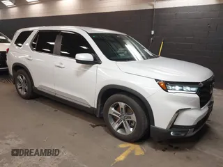 2023 Honda Pilot EX-L z VIN 5FNYG1H5XPB043275, wystawiony jako IAAI lot #41747522 z przebiegiem 18 865 mil mil oraz . Historia ofert i sprzedaży dostępna na DreamBid. Obrazek 1.