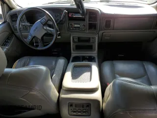 2004 GMC Yukon SLE with VIN 1GKEK13V24J236327, listed as a Copart auction lot 76896974 with 151,028 mi miles and Salvage Title. Bid and sale history available at carsss.com. Image 8.