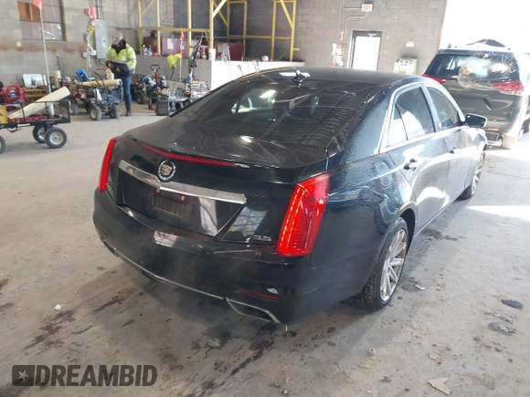 2014 Cadillac CTS Luxury AWD with VIN 1G6AX5S31E0143179, listed as a IAAI auction lot 41421639 with 135,810 mi miles and . Bid and sale history available at DreamBid. Image 4.