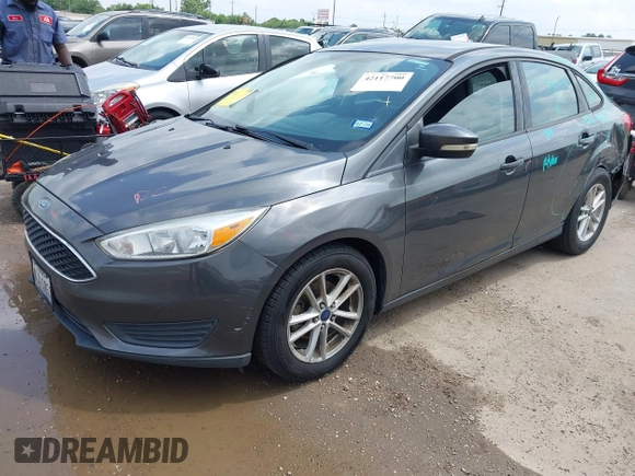 2017 Ford Focus SE with VIN 1FADP3F23HL232809, listed as a IAAI auction lot 42117700 with 104,802 mi miles and . Bid and sale history available at DreamBid. Image 2.