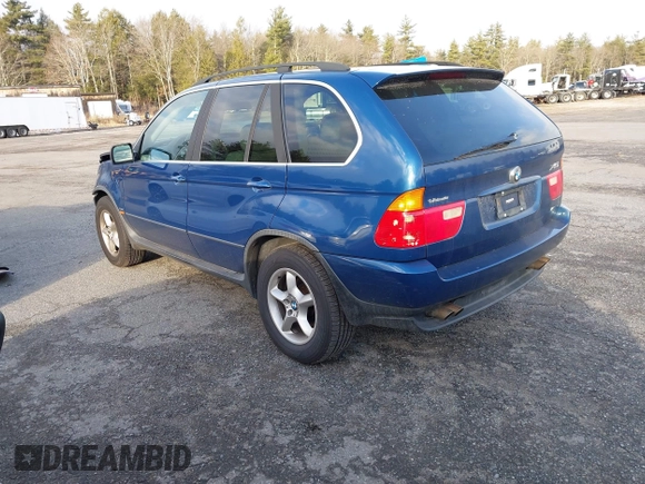 2001 BMW X5 4.4i with VIN WBAFB33501LH24719, listed as a IAAI auction lot 41055076 with 126,530 mi miles. Bid and sale history available at carsss.com. Image 3.