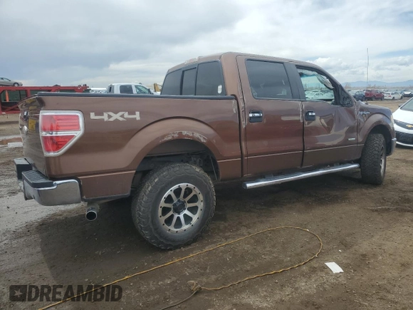 2011 Ford F-150 XLT with VIN 1FTFW1ETXBFB51042, listed as a Copart auction lot 51473695 with 179,195 mi miles and Salvage Title. Bid and sale history available at carsss.com. Image 3.