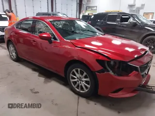 2014 Mazda 6 i Sport with VIN JM1GJ1U61E1142908, listed as a IAAI auction lot 41916081 with 147,770 mi miles. Bid and sale history available at carsss.com. Image 1.