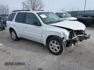 2003 Oldsmobile Bravada z VIN 1GHDT13S732286332, wystawiony jako IAAI lot #41303296 z przebiegiem 84 356 mil mil oraz . Historia ofert i sprzedaży dostępna na DreamBid. Obrazek 1.