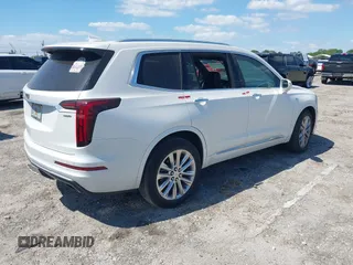 2020 Cadillac XT6 FWD Premium Luxury z VIN 1GYKPCRS1LZ228982, wystawiony jako IAAI lot #41975364 z przebiegiem 84 803 mil mil oraz . Historia ofert i sprzedaży dostępna na DreamBid. Obrazek 4.