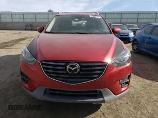 2016 Mazda CX-5 Grand Touring with VIN JM3KE4DYXG0850270, listed as a Copart auction lot 83681274 with 121,486 mi miles and Salvage Title. Bid and sale history available at carsss.com. Image 5.