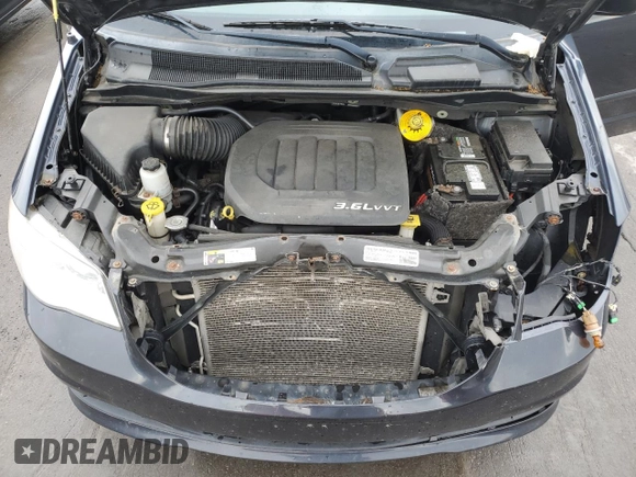 2014 Dodge Grand Caravan SE 30th Anniversary with VIN 2C4RDGBG1ER457489, listed as a Copart auction lot 54301225 with 157,740 mi miles and Salvage Title. Bid and sale history available at DreamBid. Image 12.