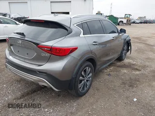 2017 Infiniti QX30 Premium z VIN SJKCH5CR2HA022260, wystawiony jako IAAI lot #42067553 z przebiegiem 85 301 mil mil oraz . Historia ofert i sprzedaży dostępna na DreamBid. Obrazek 4.