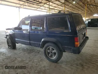 1996 Jeep Cherokee Sport with VIN 1J4FT68S1TL275271, listed as a Copart auction lot 72701214 with 235,651 mi miles and Salvage Title. Bid and sale history available at carsss.com. Image 2.