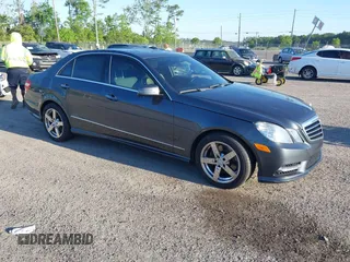 2013 Mercedes-Benz E-Class E 350 Luxury BlueTEC with VIN WDDHF2EB8DA741915, listed as a IAAI auction lot 42026412 with 105,569 mi miles. Bid and sale history available at carsss.com. Image 1.