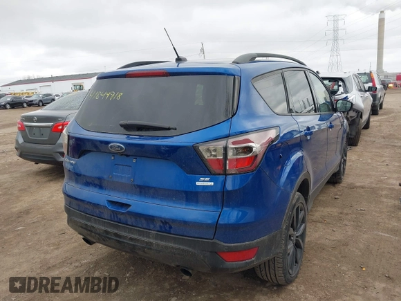 2017 Ford Escape SE with VIN 1FMCU0GD1HUC22489, listed as a IAAI auction lot 41844918 with 113,000 mi miles. Bid and sale history available at carsss.com. Image 4.