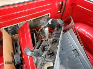 1986 Suzuki Samurai z VIN JS3JC51V4G4101985, wystawiony jako Copart lot #87197554 z przebiegiem Nie podano mil oraz Tytuł czysty. Historia ofert i sprzedaży dostępna na DreamBid. Obrazek 12.