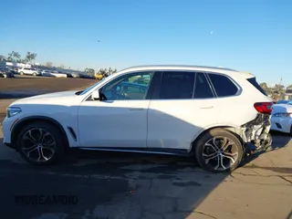 2021 BMW X5 sDrive40i with VIN 5UXCR4C03M9G59554, listed as a IAAI auction lot 41358056 with 47,577 mi miles. Bid and sale history available at carsss.com. Image 15.