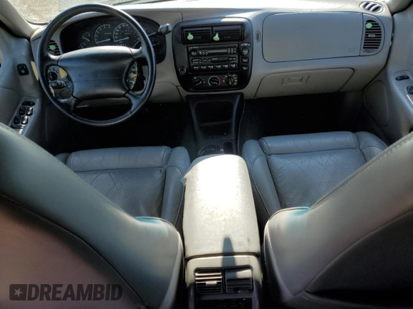 1997 Mercury Mountaineer with VIN 4M2DU55P5VUJ62435, listed as a Copart auction lot 60163465 with 105,646 mi miles and Salvage title. Bid and sale history available at DreamBid. Image 8.