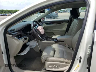 2013 Cadillac XTS Luxury with VIN 2G61P5S33D9125769, listed as a Copart auction lot 59671015 with 143,583 mi miles and Salvage title. Bid and sale history available at DreamBid. Image 7.