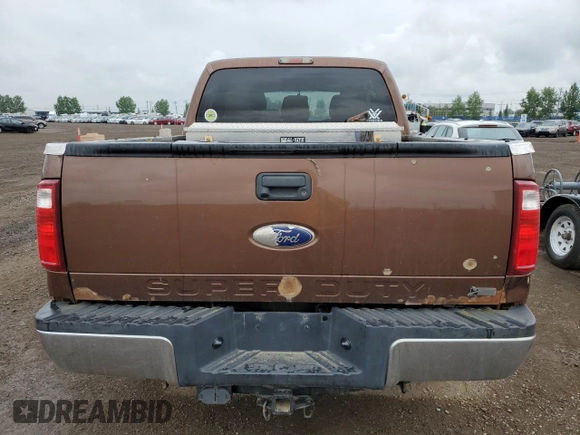 2011 Ford F-250 XL with VIN 1FT7W2B69BEC99908, listed as a Copart auction lot 61919585 with 410,259 mi miles and Salvage title. Bid and sale history available at DreamBid. Image 6.