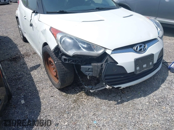 2015 Hyundai Veloster z VIN KMHTC6AD8FU228494, wystawiony jako IAAI lot #42231797 z przebiegiem 111 141 mil mil oraz . Historia ofert i sprzedaży dostępna na DreamBid. Obrazek 6.