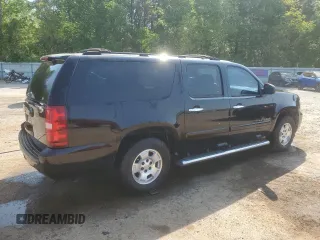 2007 Chevrolet Suburban LTZ with VIN 3GNFC16087G129261, listed as a Copart auction lot 53371595 with 159,138 mi miles and Salvage title. Bid and sale history available at DreamBid. Image 3.