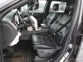 2015 Jeep Grand Cherokee Summit with VIN 1C4RJFJT6FC806660, listed as a Copart auction lot 88279395 with 173,735 mi miles and Salvage Title. Bid and sale history available at carsss.com. Image 7.