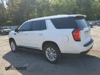 2021 GMC Yukon SLT with VIN 1GKS1BKT0MR425247, listed as a Copart auction lot 69205584 with 72,952 mi miles and Salvage Title. Bid and sale history available at carsss.com. Image 2.