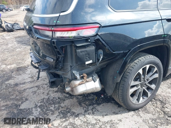 2021 Jeep Grand Cherokee Overland z VIN 1C4RJKDG7M8140271, wystawiony jako IAAI lot #41806329 z przebiegiem 39 160 mil mil oraz . Historia ofert i sprzedaży dostępna na DreamBid. Obrazek 19.