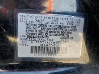 2017 Nissan Versa SV z VIN 3N1CN7AP8HL841701, wystawiony jako Copart lot #55702695 z przebiegiem 111 104 mil mil oraz Szkoda całkowita • Salvage title. Historia ofert i sprzedaży dostępna na DreamBid. Obrazek 13.