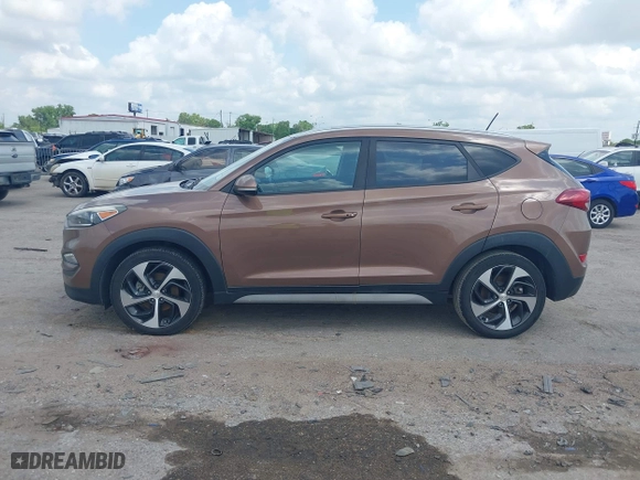 2017 Hyundai Tucson Value with VIN KM8J33A27HU430198, listed as a IAAI auction lot 42104369 with 163,929 mi miles. Bid and sale history available at carsss.com. Image 14.