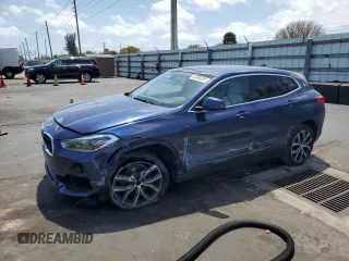 2018 BMW X2 sDrive28i with VIN WBXYJ3C39JEJ75183, listed as a Copart auction lot 52098295 with 70,280 mi miles and Salvage Title. Bid and sale history available at carsss.com. Image 1.