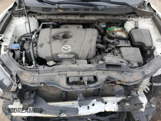 2015 Mazda CX-5 Sport z VIN JM3KE4BY2F0516574, wystawiony jako Copart lot #84100544 z przebiegiem Nie podano mil oraz Szkoda całkowita • Salvage title. Historia ofert i sprzedaży dostępna na DreamBid. Obrazek 13.