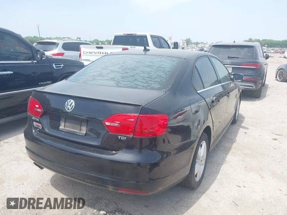 2012 Volkswagen Jetta TDI w/Premium with VIN 3VWLL7AJ0CM360730, listed as a IAAI auction lot 42029644 with 159,074 mi miles and . Bid and sale history available at DreamBid. Image 4.