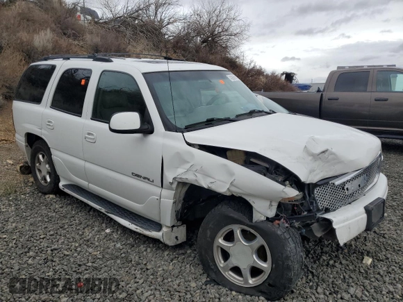 2001 GMC Yukon Denali z VIN 1GKEK63U01J287101, wystawiony jako Copart lot #43659115 z przebiegiem Nie podano mil oraz Szkoda całkowita • Salvage title. Historia ofert i sprzedaży dostępna na DreamBid. Obrazek 4.