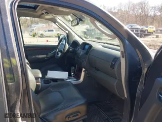 2012 Nissan Pathfinder SV with VIN 5N1AR1NB4CC639183, listed as a IAAI auction lot 42010428 with 145,371 mi miles. Bid and sale history available at carsss.com. Image 5.