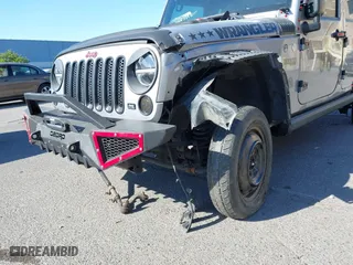 2015 Jeep Wrangler Unlimited Sport with VIN 1C4BJWDG7FL587014, listed as a IAAI auction lot 40641034 with 81,045 mi miles. Bid and sale history available at carsss.com. Image 6.