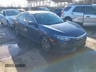 2017 Honda Civic EX z VIN 2HGFC2F70HH560496, wystawiony jako IAAI lot #41232581 z przebiegiem 102 414 mil mil oraz . Historia ofert i sprzedaży dostępna na DreamBid. Obrazek 1.