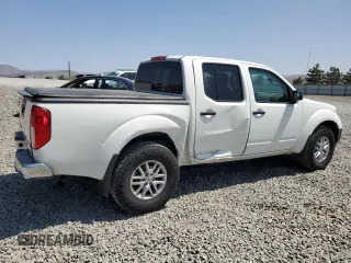 2019 Nissan Frontier Pro-4X with VIN 1N6AD0EV1KN726563, listed as a Copart auction lot 59562995 with 195,113 mi miles and Salvage title. Bid and sale history available at DreamBid. Image 3.