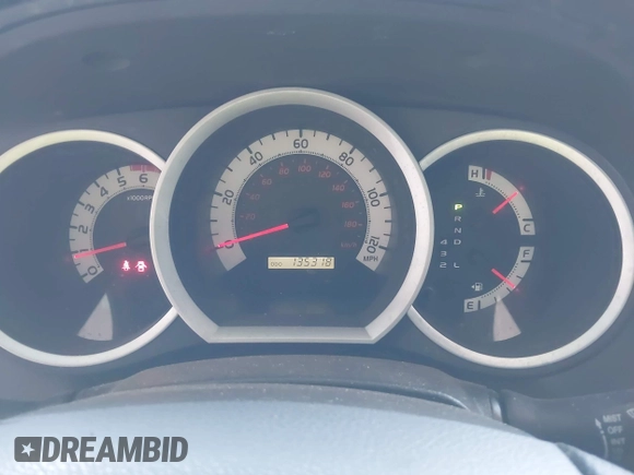 2014 Toyota Tacoma with VIN 3TMLU4EN3EM162738, listed as a IAAI auction lot 41871226 with 135,318 mi miles and . Bid and sale history available at DreamBid. Image 7.