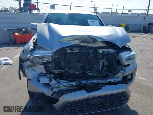 2021 Toyota Tacoma SR with VIN 5TFCZ5AN6MX270972, listed as a IAAI auction lot 42460823 with 76,062 mi miles and . Bid and sale history available at DreamBid. Image 13.