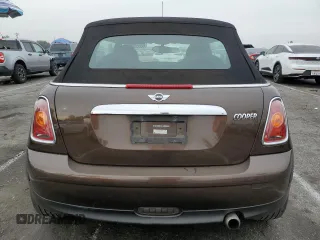 2009 MINI Convertible с VIN WMWMR335X9TU96627, выставлен на аукционе Copart как лот 86551094 с пробегом 91 843 миль миль и Чистый • Clean title. История ставок и продаж доступна на DreamBid. Изображение 6.