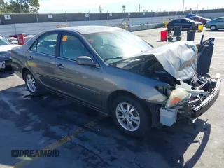 2004 Toyota Camry LE with VIN 4T1BF32K44U578104, listed as a IAAI auction lot 40789804 with 1 mi miles. Bid and sale history available at carsss.com. Image 1.