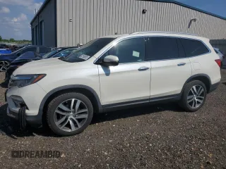 2018 Honda Pilot Touring with VIN 5FNYF6H93JB038624, listed as a Copart auction lot 62190605 with 94,673 mi miles and Salvage title. Bid and sale history available at DreamBid. Image 1.