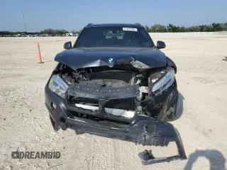 2018 BMW X5 xDrive35i with VIN 5UXKR0C56JL073040, listed as a Copart auction lot 51483765 with 77,189 mi miles and Clean Title. Bid and sale history available at carsss.com. Image 5.