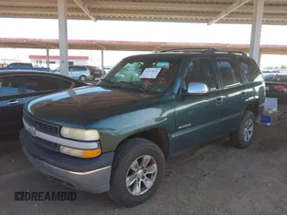 2002 Chevrolet Tahoe LT z VIN 1GNEK13ZX2J257347, wystawiony jako IAAI lot #42433634 z przebiegiem 252 817 mil mil oraz . Historia ofert i sprzedaży dostępna na DreamBid. Obrazek 2.