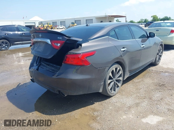 2016 Nissan Maxima SR z VIN 1N4AA6AP0GC400686, wystawiony jako IAAI lot #42378284 z przebiegiem 139 996 mil mil oraz . Historia ofert i sprzedaży dostępna na DreamBid. Obrazek 4.
