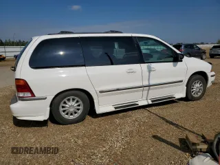 2001 Ford Windstar SEL with VIN 2FMDA56461BA55148, listed as a Copart auction lot 66531405 with 74,409 mi miles and Salvage title. Bid and sale history available at DreamBid. Image 3.